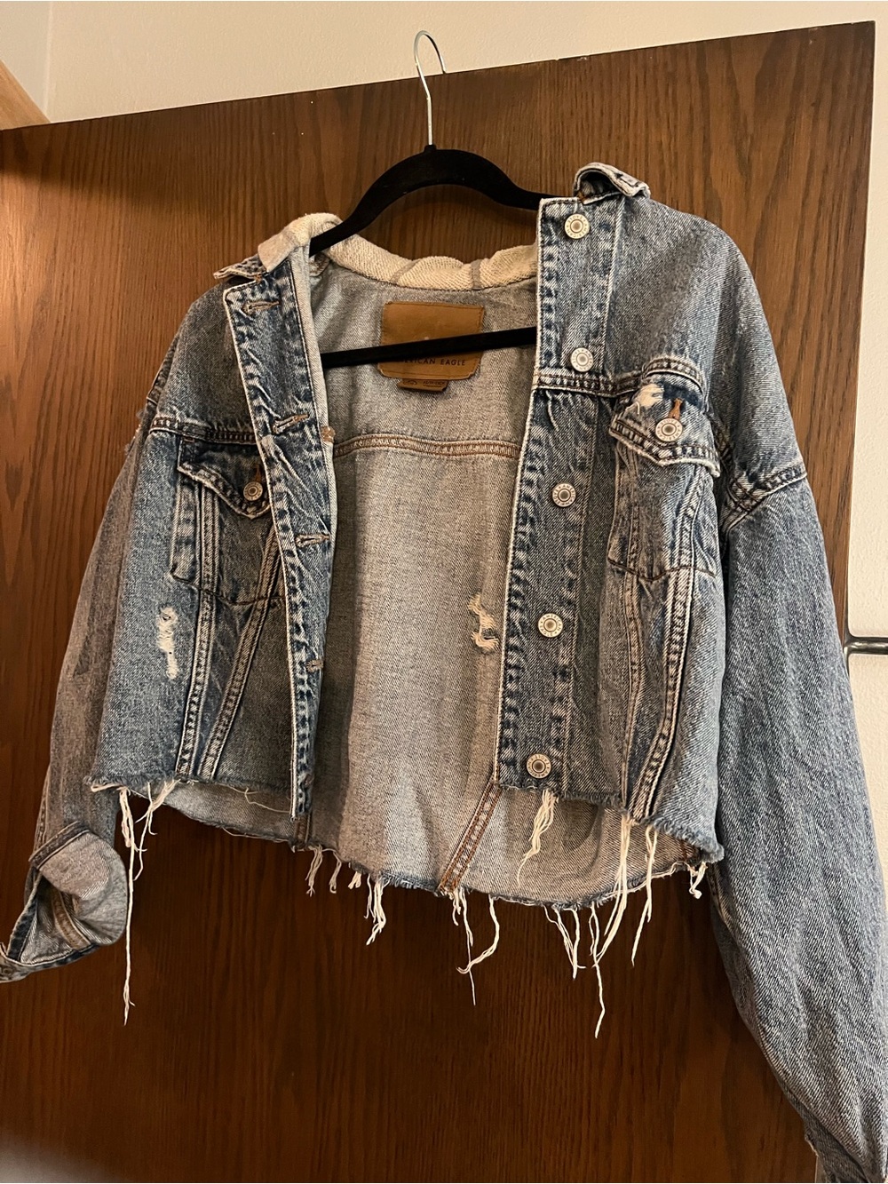 American Eagle Outfitters Distressed Cropped Denim Jacket in Light Blue